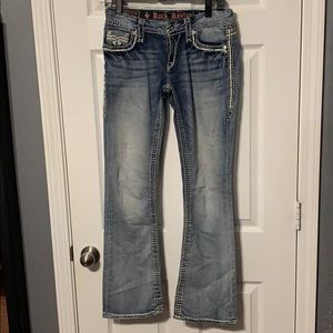 Like new rock revival studded jeans boot cut style